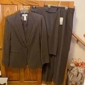 Liz Claiborne 3 pc. Suit. Jacket, Pants & skirt. Skirt has tags on it.